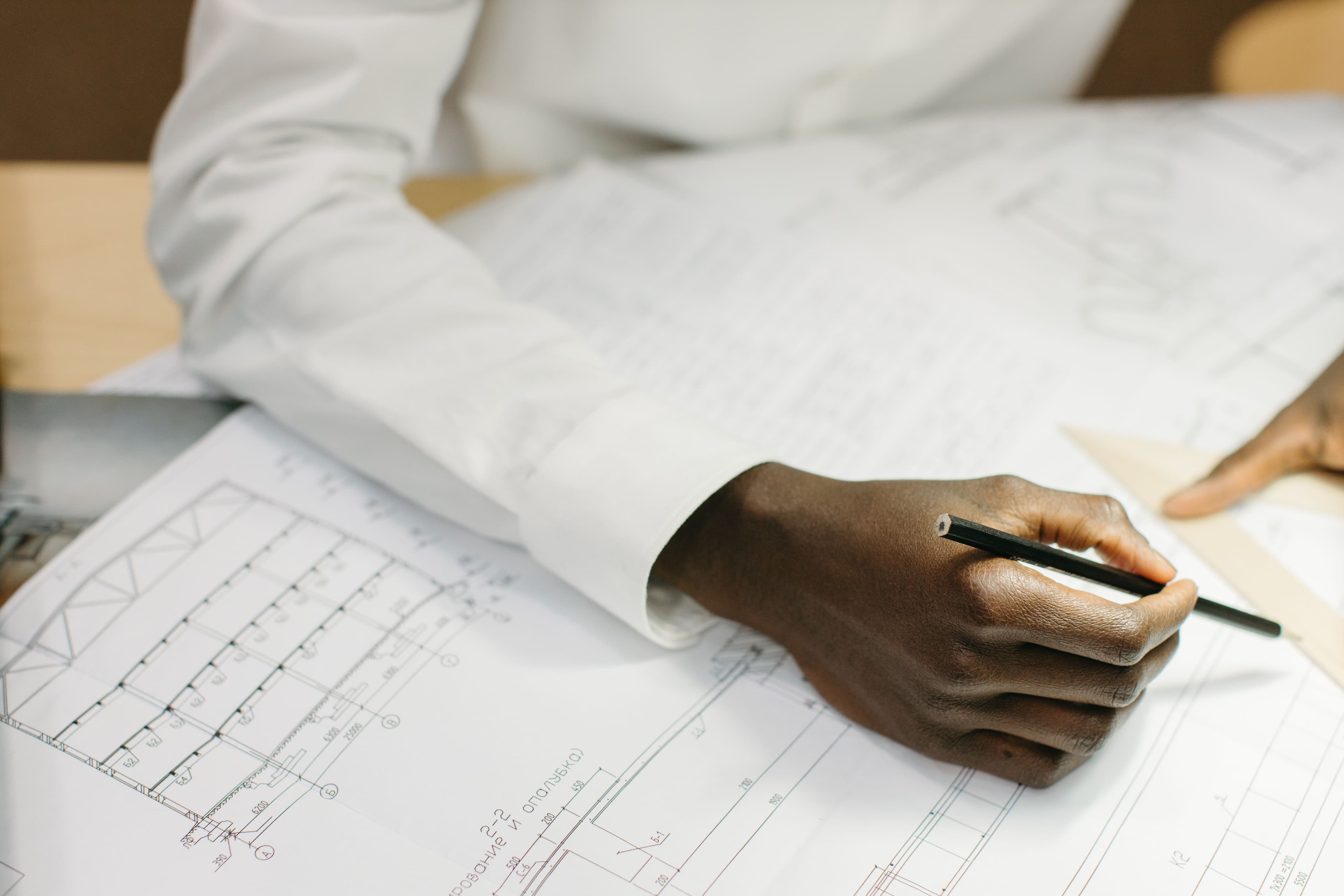 MATT engineer reviewing technical drawings
